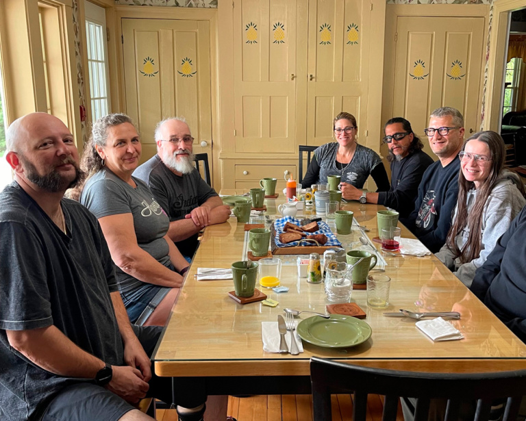 Bike week attendees at the  table for breakfast