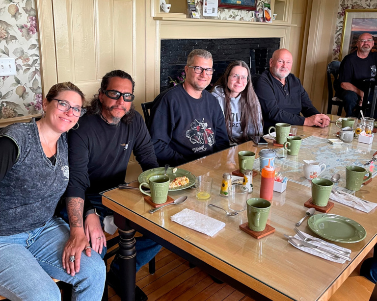 Bike week attendees at the table for breakfast