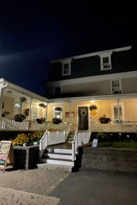 The entrance of the Ballard House Inn at night